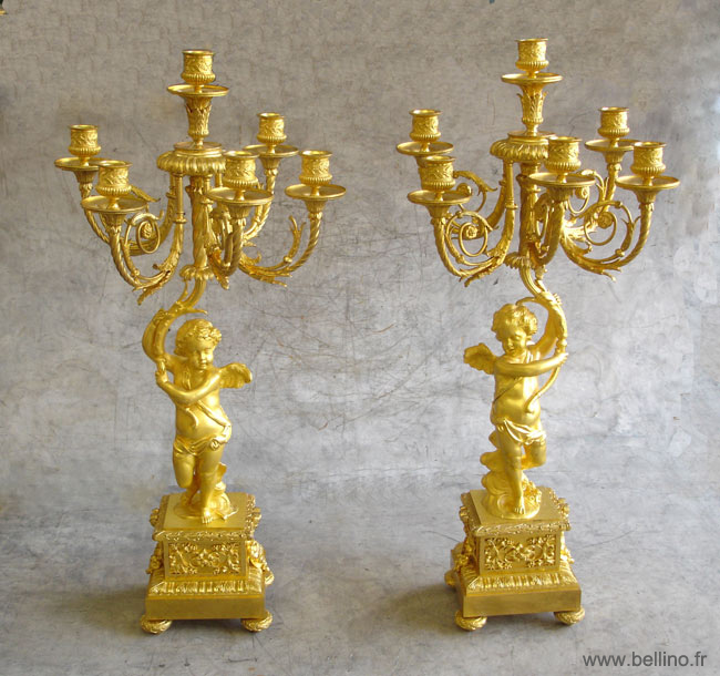 Les chandeliers XIXème en bronze doré après restauration