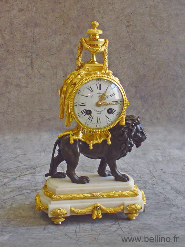 pendule "au lion" après dorure pendule "au lion" après restauration