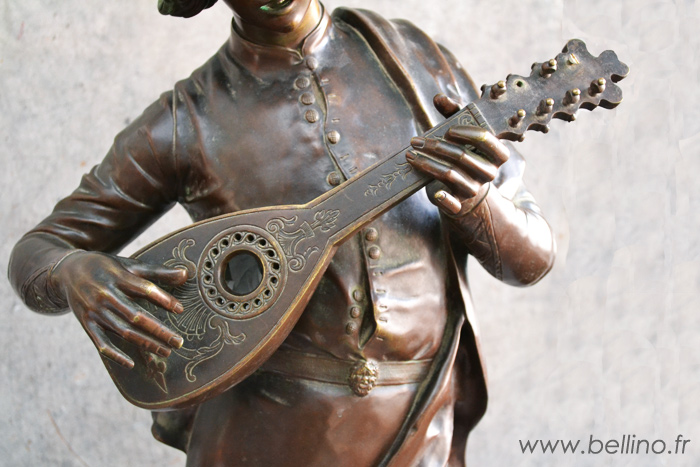 Détail de l'instrument du chanteur florentin Détail du chanteur florentin de Paul Dubois